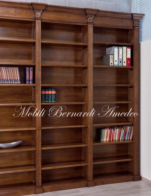 Libreria in stile classico da studio o biblioteca realizzata in legno massello con capitelli intagliati